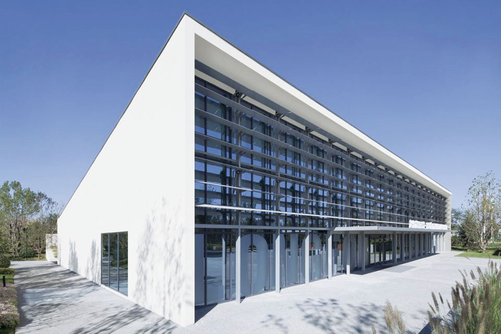 Gigantic dimensions in the  Middle Kingdom: China's  largest wooden passive house façade stands in Gaobeidian